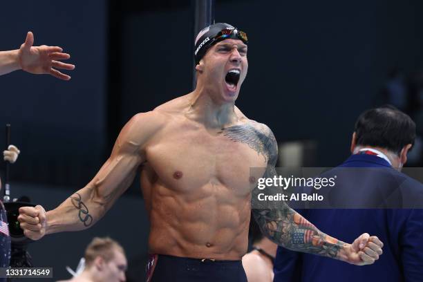 Caeleb Dressel of Team United States reacts after winning the gold medal and breaking the world record in the Men's 4 x 100m Medley Relay Final on...
