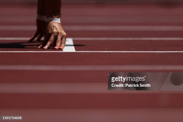 Detail view of a runner's hands during round one of the Men's 400m heats on day nine of the Tokyo 2020 Olympic Games at Olympic Stadium on August 01,...