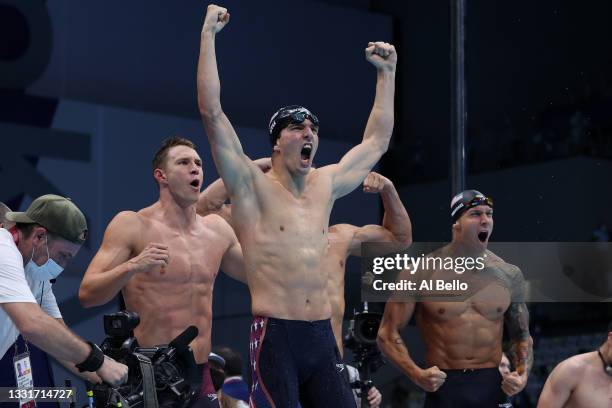 Zach Apple and teammates of Team United States react after winning the gold medal and breaking the world record in the Men's 4 x 100m Medley Relay...