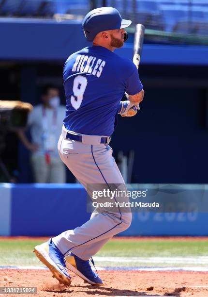 Nick Rickles of Team Israel hits a two-RBI single to center field in the third inning against Team Mexico during round one of baseball team...