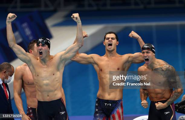 Team United States react after winning the gold medal and breaking the world record in the Men's 4 x 100m Medley Relay Final on day nine of the Tokyo...