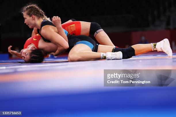 Aline Rotter Focken of Team Germany competes against Qian Zhou of Team China during the Women's Freestyle 76kg Quarter Final on day nine of the Tokyo...