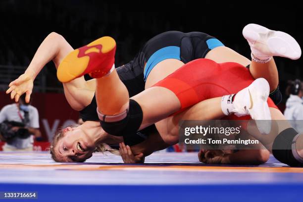 Aline Rotter Focken of Team Germany competes against Qian Zhou of Team China during the Women's Freestyle 76kg Quarter Final on day nine of the Tokyo...