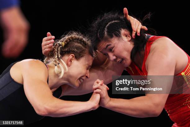 Aline Rotter Focken of Team Germany competes against Qian Zhou of Team China during the Women's Freestyle 76kg Quarter Final on day nine of the Tokyo...