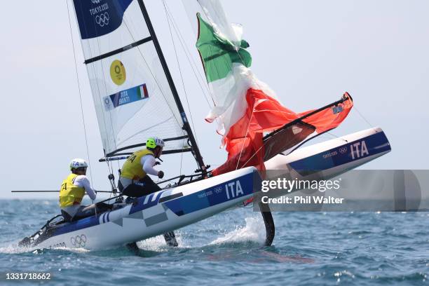 Ruggero Tita and Caterina Banti of Team Italy compete in the Nacra 17 Foiling class on day nine of the Tokyo 2020 Olympic Games at Enoshima Yacht...