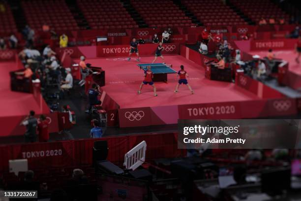 Players from Team Brazil and Team Hong Kong in action during their Women's Team Round of 16 table tennis match on day nine of the Tokyo 2020 Olympic...