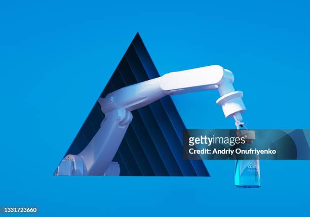 robotic hand with vaccine. - brazo robótico fotografías e imágenes de stock