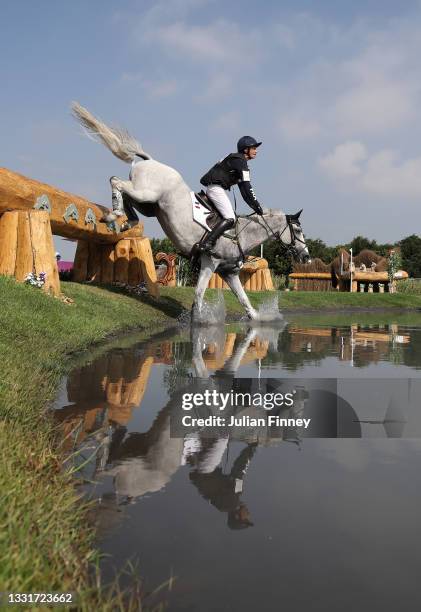 Christopher Six of Team France riding Totem de Brecey clears a jump during the Eventing Cross Country Team and Individual on day nine of the Tokyo...