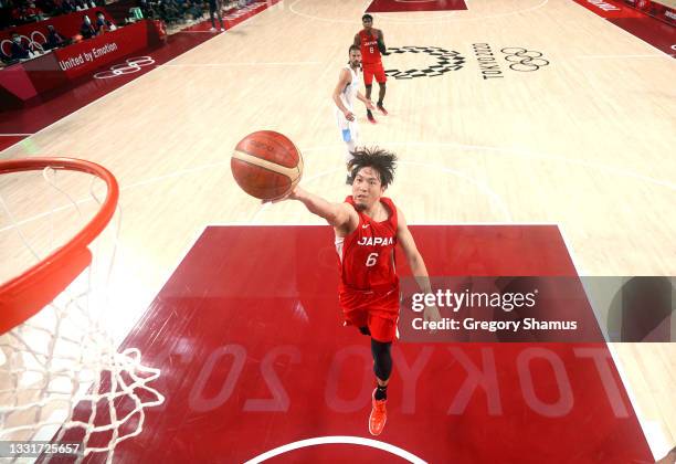 Makoto Hiejima of Team Japan goes up for a shot against against Argentina during the first half of a Men's Basketball Preliminary Round Group C game...