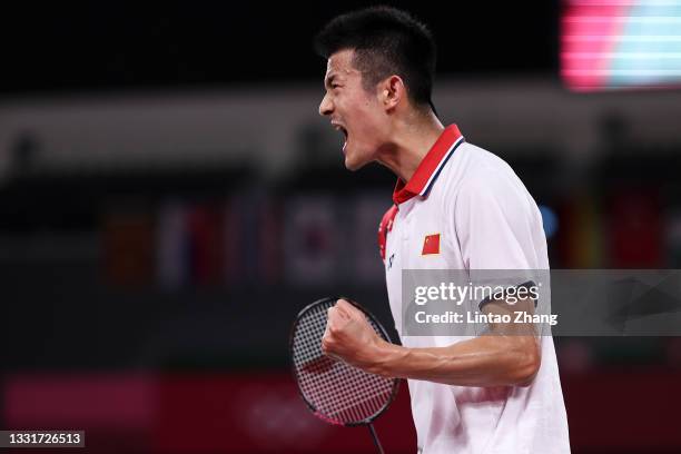 Chen Long of Team China reacts as he competes against Anthony Sinisuka Ginting of Team Indonesia during a Men's Singles Semi-final match on day nine...
