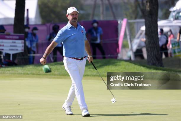 Rory Sabbatini of Team Slovakia celebrates his putt on the 18th green during the final round of the Men's Individual Stroke Play on day nine of the...