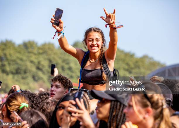 Festival-goers attend day 3 of Lollapalooza at Grant Park on July 30, 2021 in Chicago, Illinois.