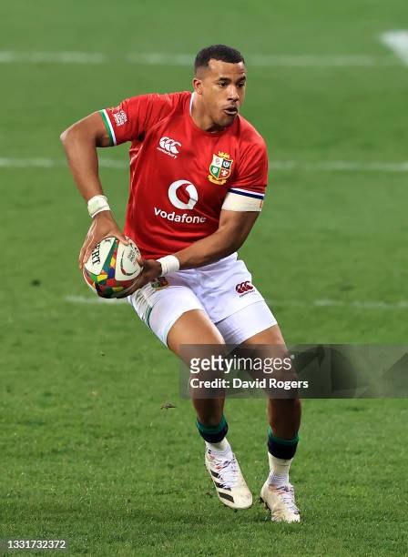 Anthony Watson of the Lions runs with the ball during the 2nd test match between es upfield South Africa Springboks and the British & Irish Lions at...