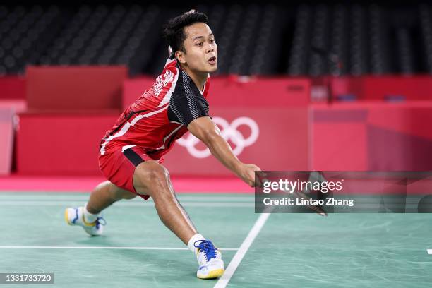 Anthony Sinisuka Ginting of Team Indonesia competes against Chen Long of Team China during a Men's Singles Semi-final match on day nine of the Tokyo...