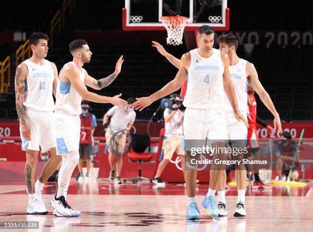 Luis Scola of Team Argentina celebrates a play against Japan during the second half of a Men's Basketball Preliminary Round Group C game at Saitama...