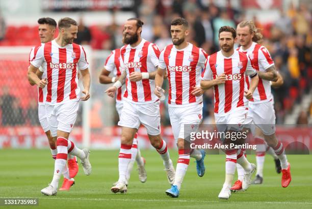 Stoke players make their way out during a Pre-Season Friendly match between Stoke City and Wolverhampton Wanderers at Britannia Stadium on July 31,...