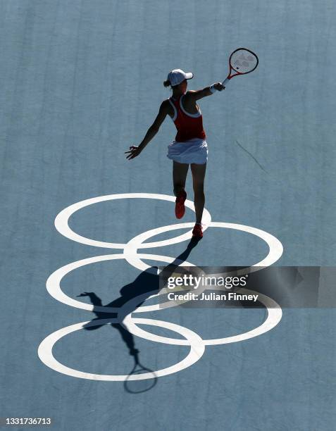 Viktorija Golubic of Team Switzerland plays a backhand during her Women's Doubles Gold Medal match with Belinda Bencic of Team Switzerland against...