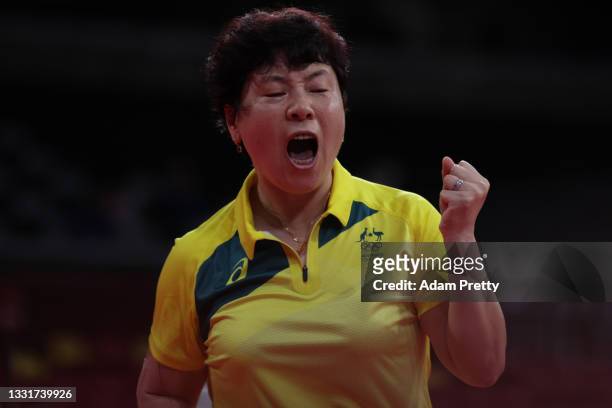 Lay Jian Fang of Team Australia reacts during her Women's Team Round of 16 table tennis match on day nine of the Tokyo 2020 Olympic Games at Tokyo...