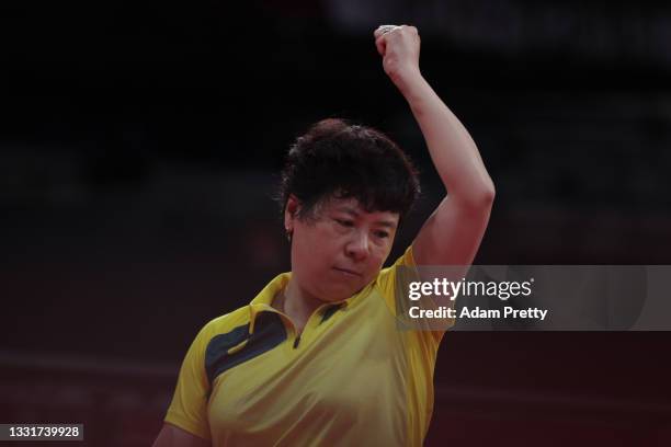 Lay Jian Fang of Team Australia reacts during her Women's Team Round of 16 table tennis match on day nine of the Tokyo 2020 Olympic Games at Tokyo...