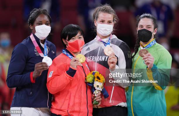 Silver medalist Madeline Malonga of Team France, gold medalist Shori Hamada of Team Japan, bronze medalists Anna-Maria Wagner of Team Germany and...