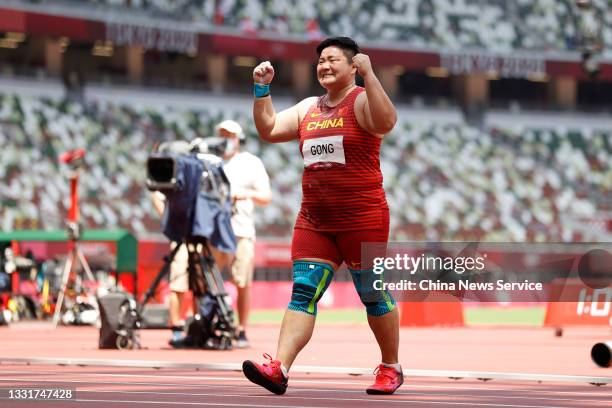 Gold medalist Gong Lijiao of China celebrates after winning the Women's Shot Put Final on day nine of the Tokyo 2020 Olympic Games at Olympic Stadium...