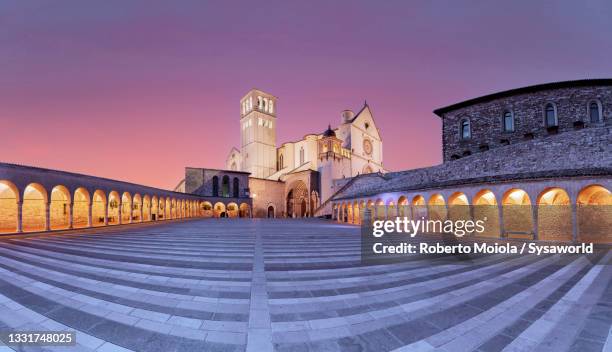 basilica di san francesco d'assisi at sunset, umbria - assisi stock pictures, royalty-free photos & images