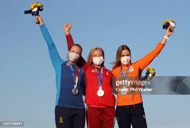 Anne-Marie Rindom of Team Denmark poses with the gold medal with silver medalist Josefin Olsson of Team Sweden and bronze medalist Marit Bouwmeester...