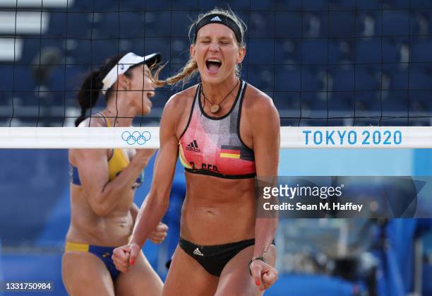 Margareta Kozuch of Team Germany reacts against Team Brazil during the Women's Round of 16 beach volleyball on day nine of the Tokyo 2020 Olympic...