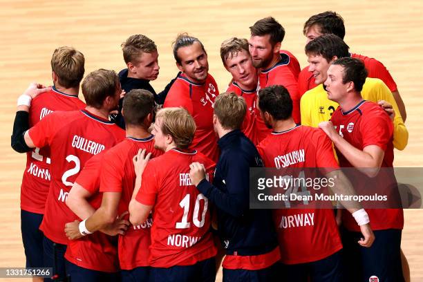 Team Norway celebrate after winning the Men's Preliminary Round Group A handball match between Norway and France on day nine of the Tokyo 2020...