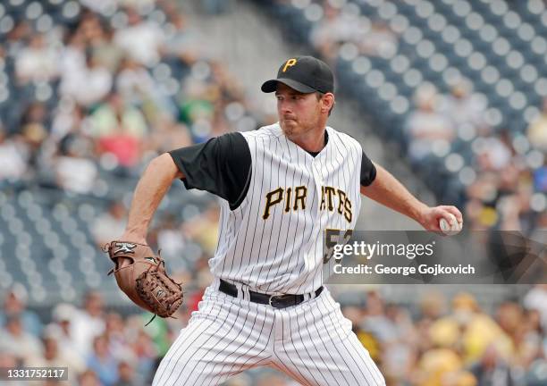 Pitcher Zach Duke of the Pittsburgh Pirates pitches against the Arizona Diamondbacks during a game at PNC Park on September 19, 2010 in Pittsburgh,...