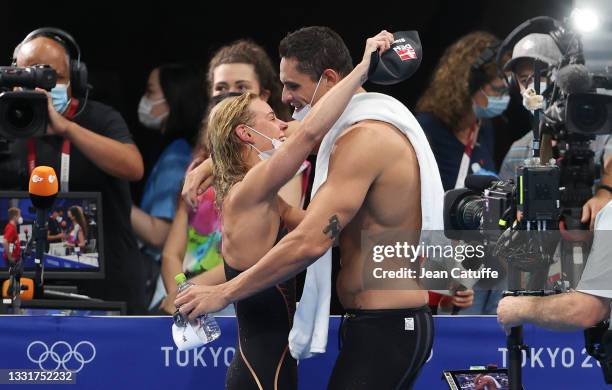 Florent Manaudou of France and his girlfriend Pernille Blume of Denmark celebrate both their Silver Medals in their respective 50m Freestyle on day...