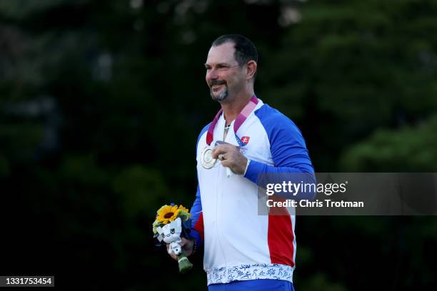 Rory Sabbatini of Team Slovakia celebrates with the silver medal during the medal ceremony after the final round of the Men's Individual Stroke Play...