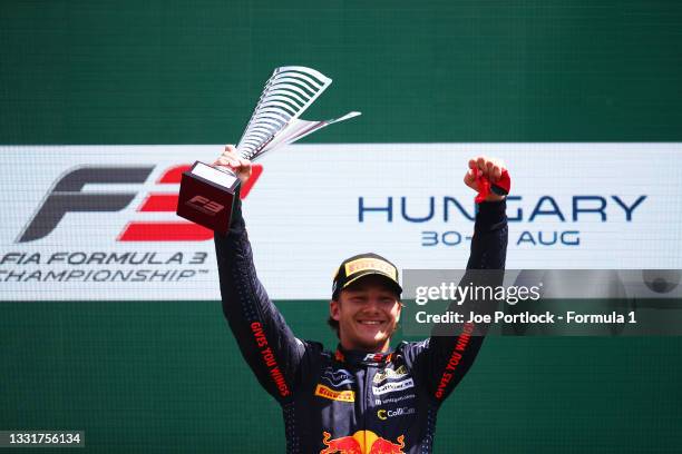 Race winner Dennis Hauger of Norway and Prema Racing celebrates on the podium during Round 4:Budapest race 3 of the Formula 3 Championship at...