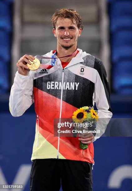 Gold medalist Alexander Zverev of Team Germany poses on the podium during the medal ceremony for Tennis Men's Singles on day nine of the Tokyo 2020...