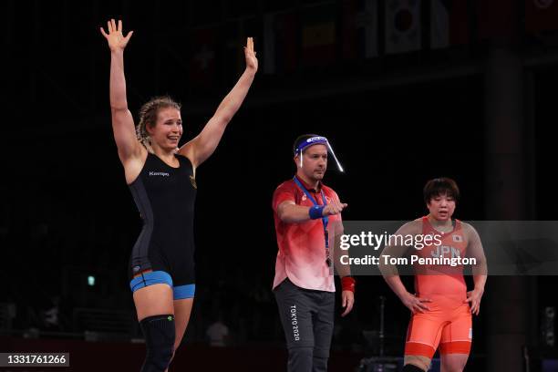 Aline Rotter Focken of Team Germany celebrates defeating Hiroe Minagawa of Team Japan during the Women’s Freestyle 76kg Semi Final on day nine of the...