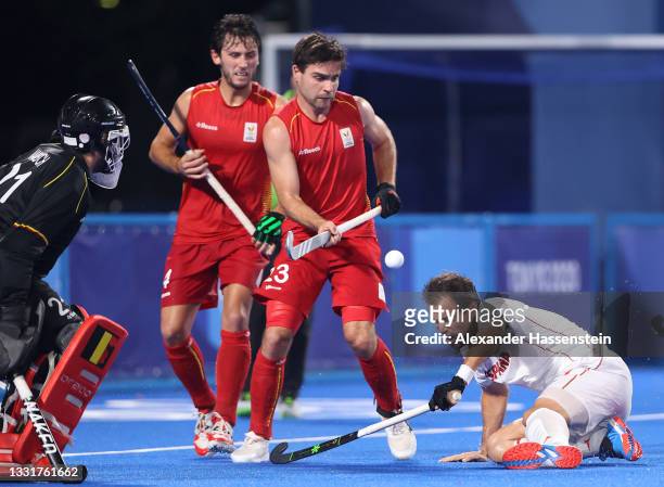 Arthur Anne-Marie Thierry de Sloover of Team Belgium looks to control the ball whilst Alvaro Iglesias Marcos of Team Spain leans to avoid the ball...
