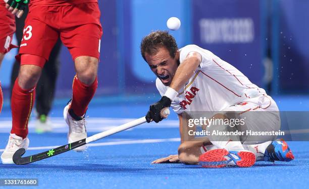 Alvaro Iglesias Marcos of Team Spain leans to avoid the ball during the Men's Quarterfinal match between Belgium and Spain on day nine of the Tokyo...