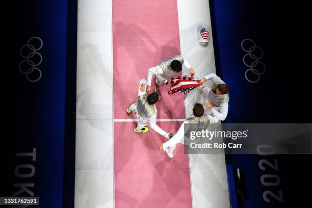 Team United States celebrate after winning the Men's Foil Team Fencing Bronze Medal Match against Team Japan on day nine of the Tokyo 2020 Olympic...