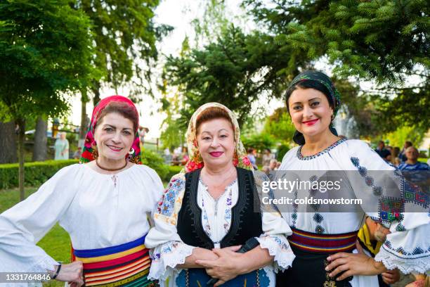 women wearing traditional romanian clothing in transylvania, romania - romania traditional stock pictures, royalty-free photos & images