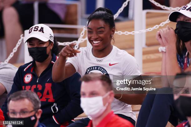 Simone Biles of Team United States smiles during the Women's Uneven Bars Final on day nine of the Tokyo 2020 Olympic Games at Ariake Gymnastics...