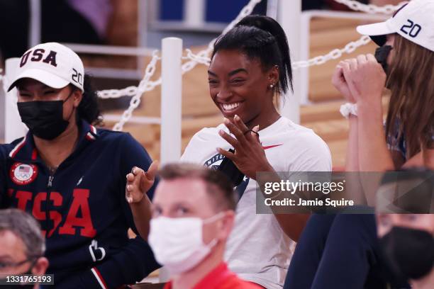 Simone Biles of Team United States smiles during the Women's Uneven Bars Final on day nine of the Tokyo 2020 Olympic Games at Ariake Gymnastics...