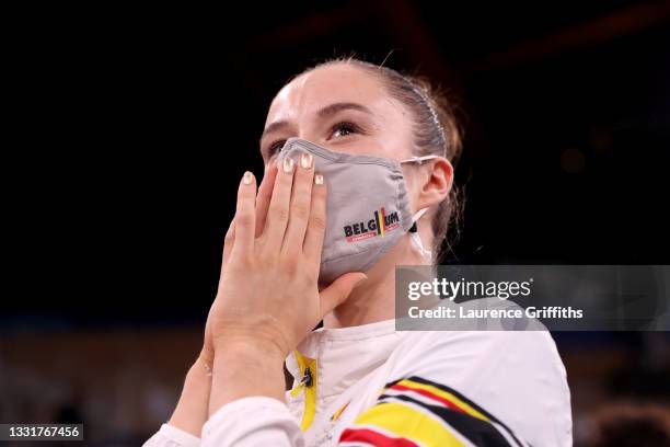 Nina Derwael of Team Belgium celebrates winning gold in the Women's Uneven Bars Final on day nine of the Tokyo 2020 Olympic Games at Ariake...