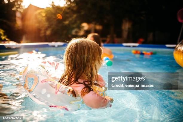 summer water games - kids pool games stock pictures, royalty-free photos & images