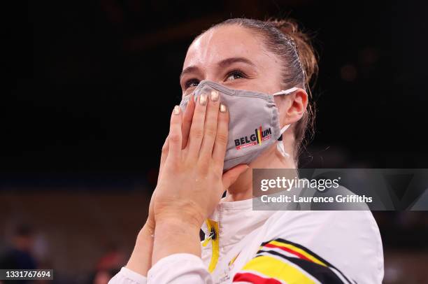 Nina Derwael of Team Belgium celebrates winning gold in the Women's Uneven Bars Final on day nine of the Tokyo 2020 Olympic Games at Ariake...