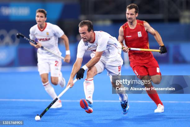 Alvaro Iglesias Marcos of Team Spain runs with the ball during the Men's Quarterfinal match between Belgium and Spain on day nine of the Tokyo 2020...