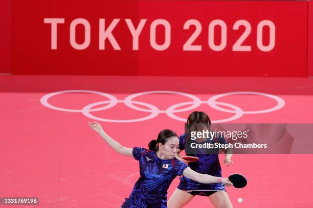 Kasumi Ishikawa and Miu Hirano of Team Japan in action during her Women's Team Round of 16 table tennis match on day nine of the Tokyo 2020 Olympic...