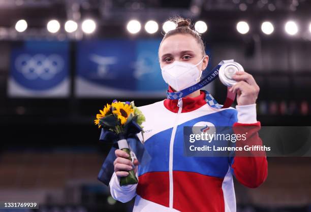 Silver medalist Anastasiia Iliankova of Team ROC poses with her medal on the podium during the Women's Uneven Bars Final medal ceremony on day nine...