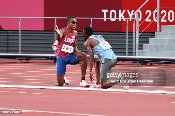 Isaiah Jewett of Team United States and Nijel Amos of Team Botswana react after falling in the Men's 800m Semi-Final on day nine of the Tokyo 2020...