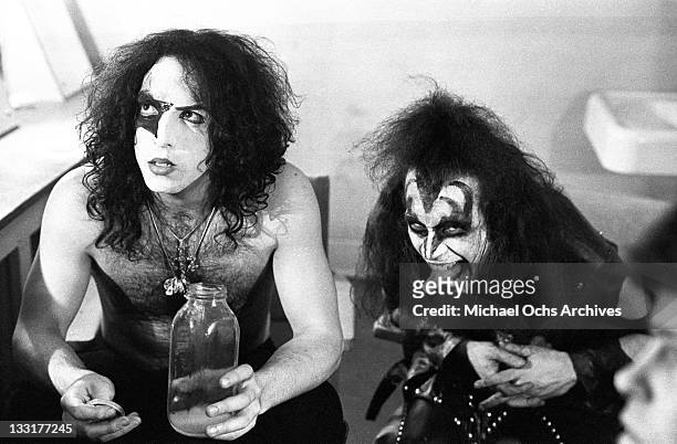 Paul Stanley and Gene Simmons of the rock and roll band 'Kiss' pose for a portrait session backstage on May 31, 1974 in Los Angeles, California.