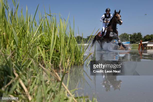 Robin Godel of Team Switzerland riding Jet Set competes during the Eventing Cross Country Team and Individual on day nine of the Tokyo 2020 Olympic...